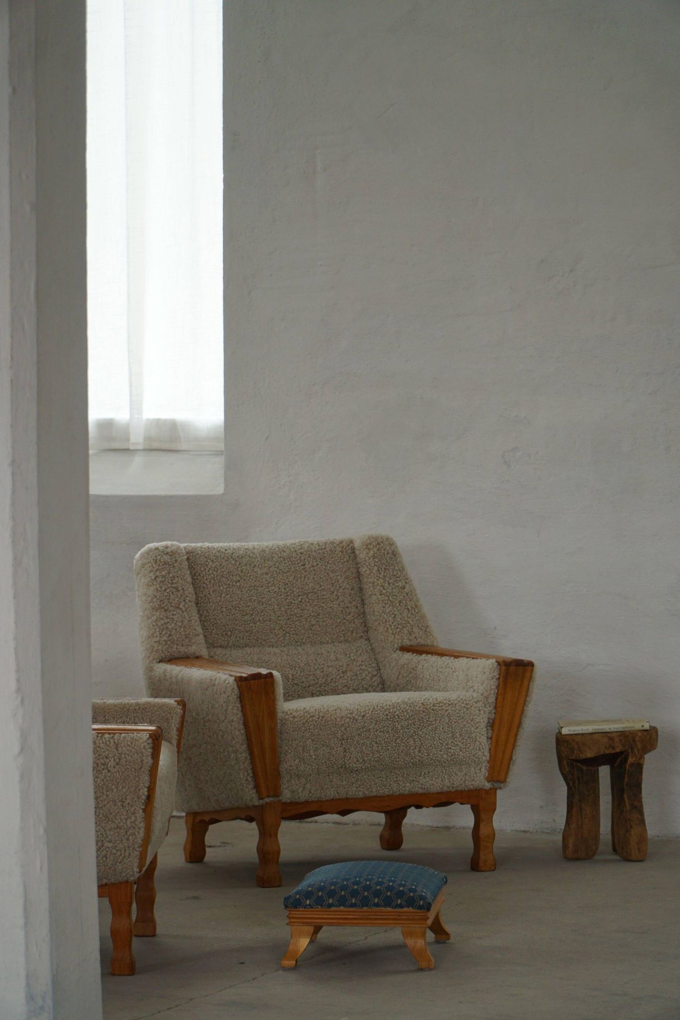 French Art Deco low stool with vintage upholstery made in the 1940s.
