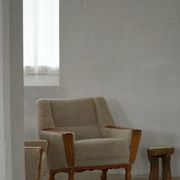 French Art Deco low stool with vintage upholstery made in the 1940s.