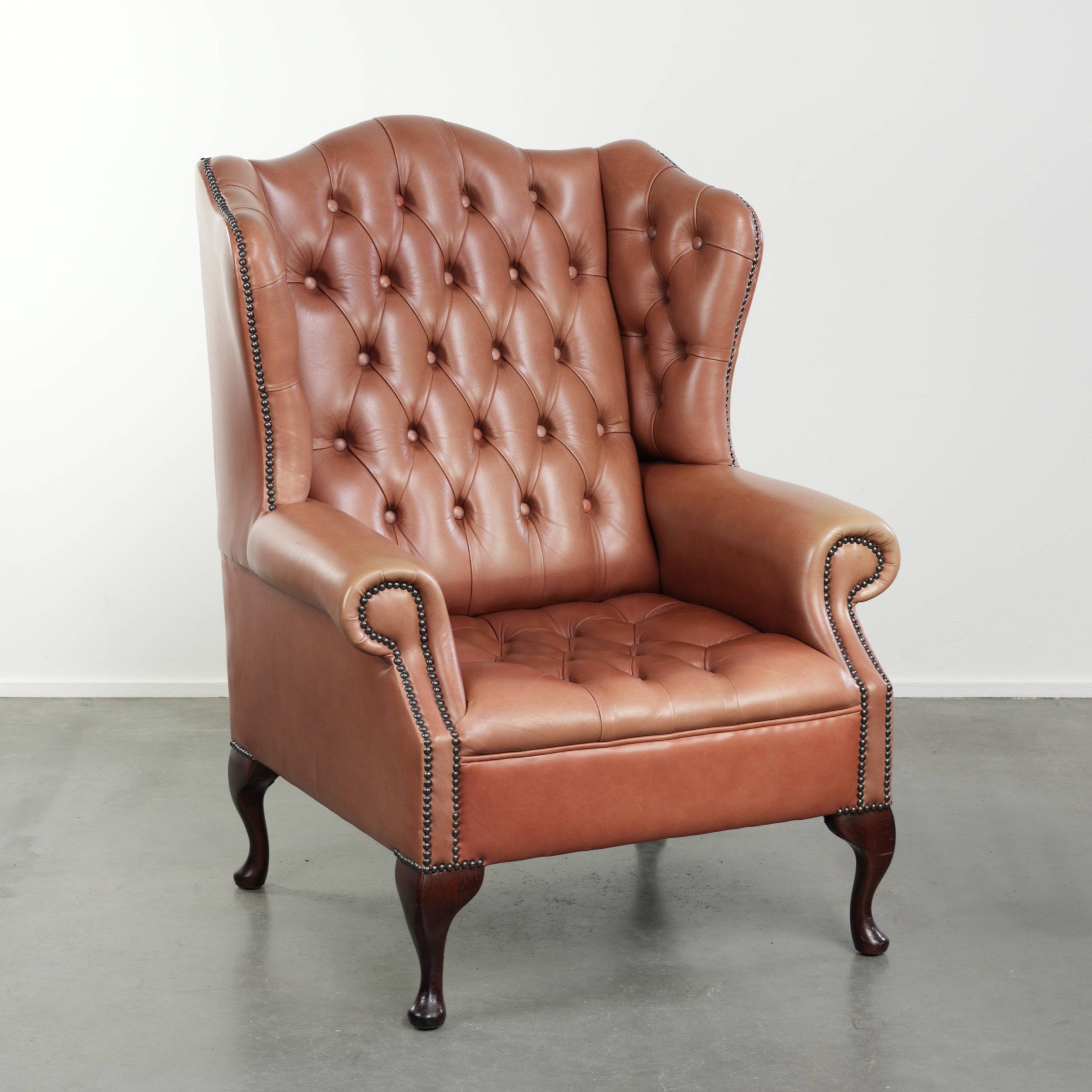 Classic English cowhide button seat chesterfield wingback armchair