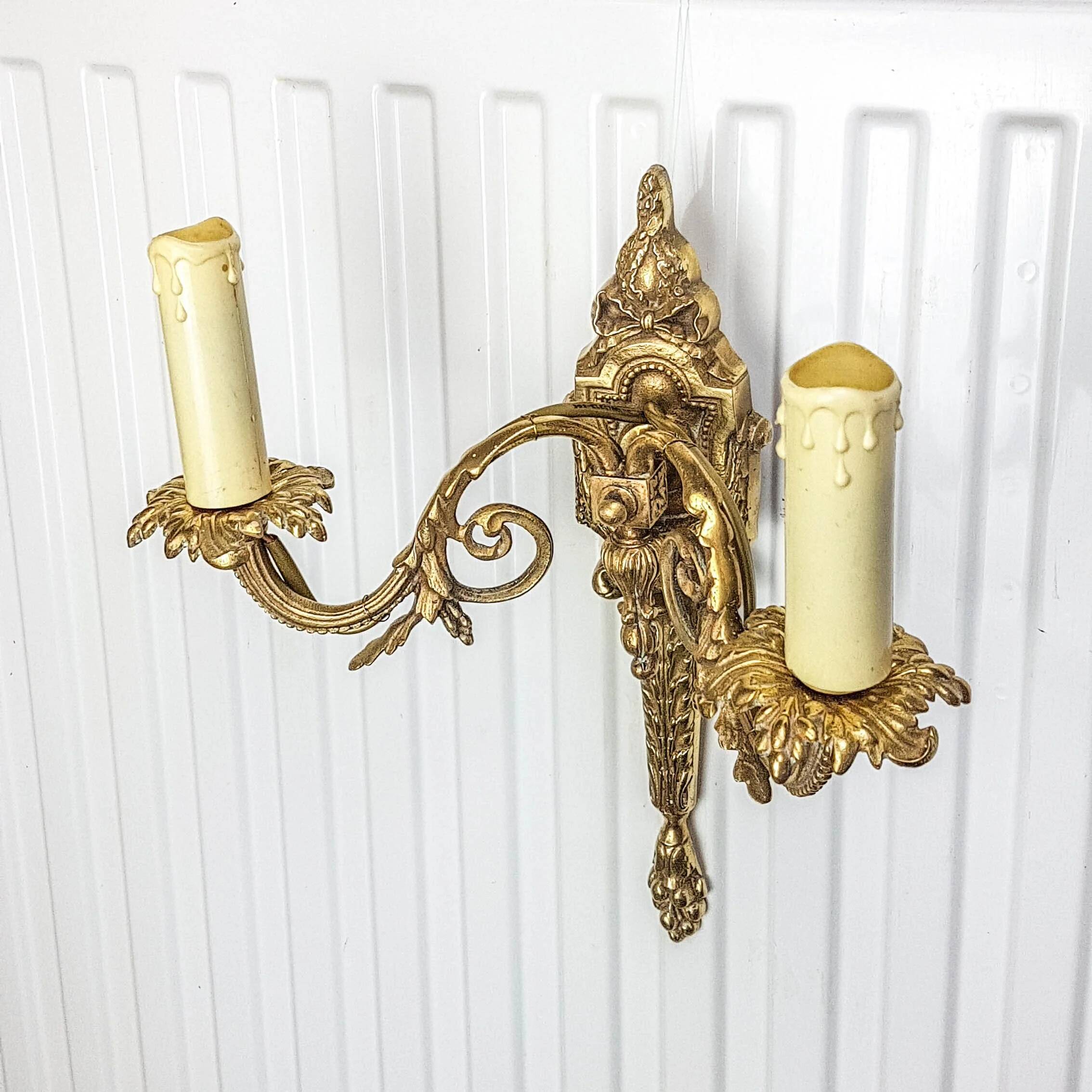 Bronze wall sconce in Empire style