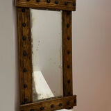 Brutalist mirror with a hammered copper and brass frame.