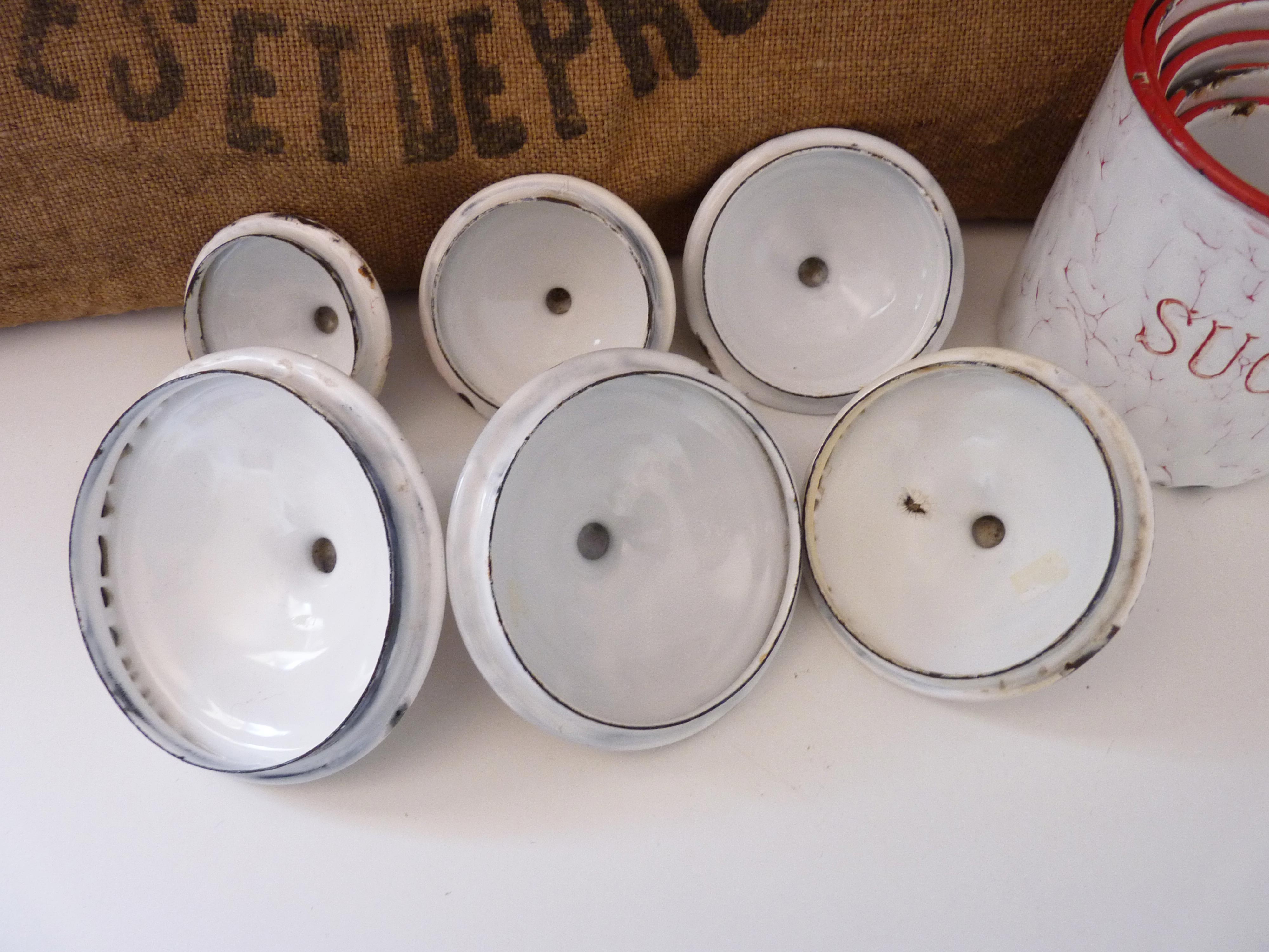 Series of 6 spice pots in white and red enamel for cooking