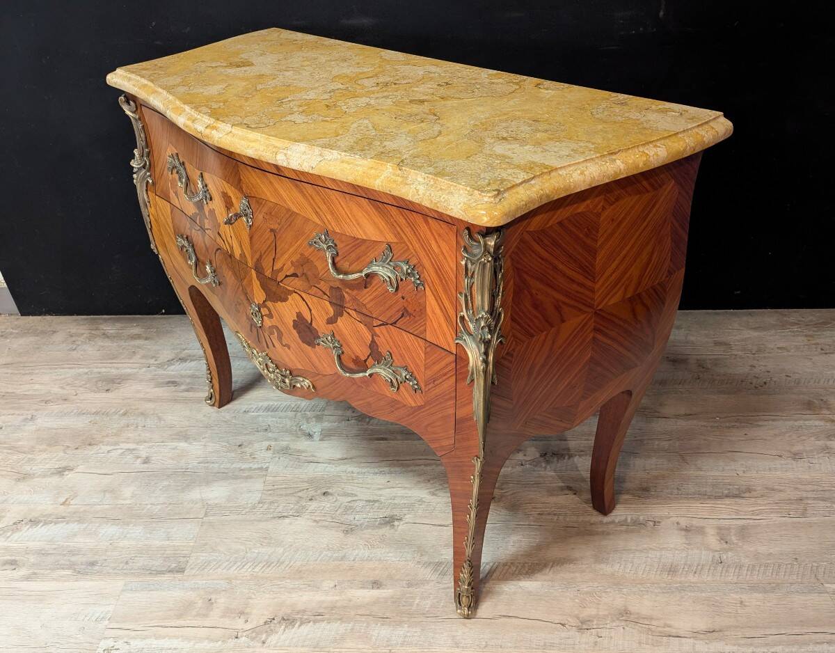 Louis XV style commode with marquetry and its pair of bedside tables.