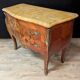 Louis XV style commode with marquetry and its pair of bedside tables.
