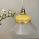 Vintage lampshade ride in yellow and transparent glass
