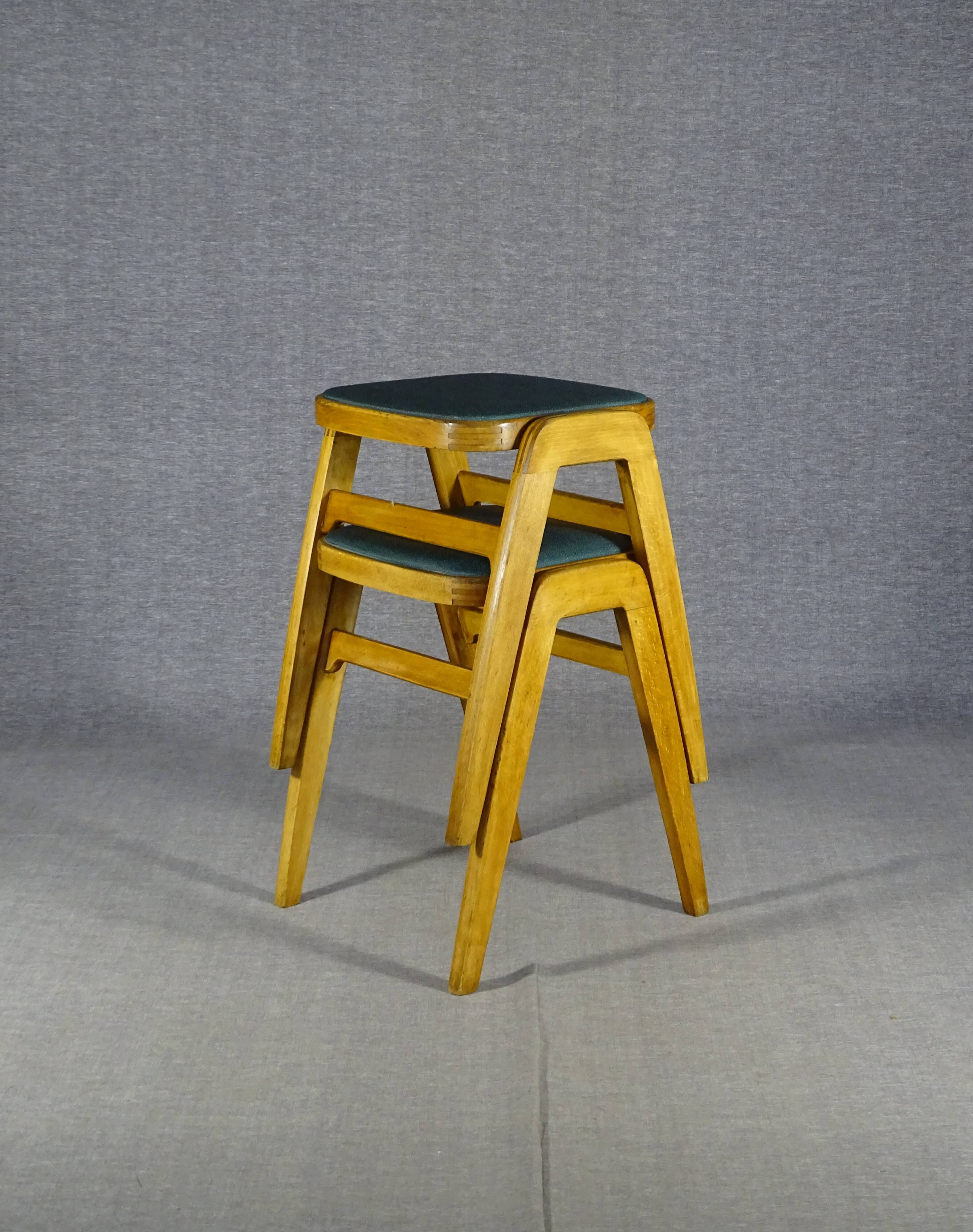 2 Mid-century green vinyl stools with compass legs from the 1960s.