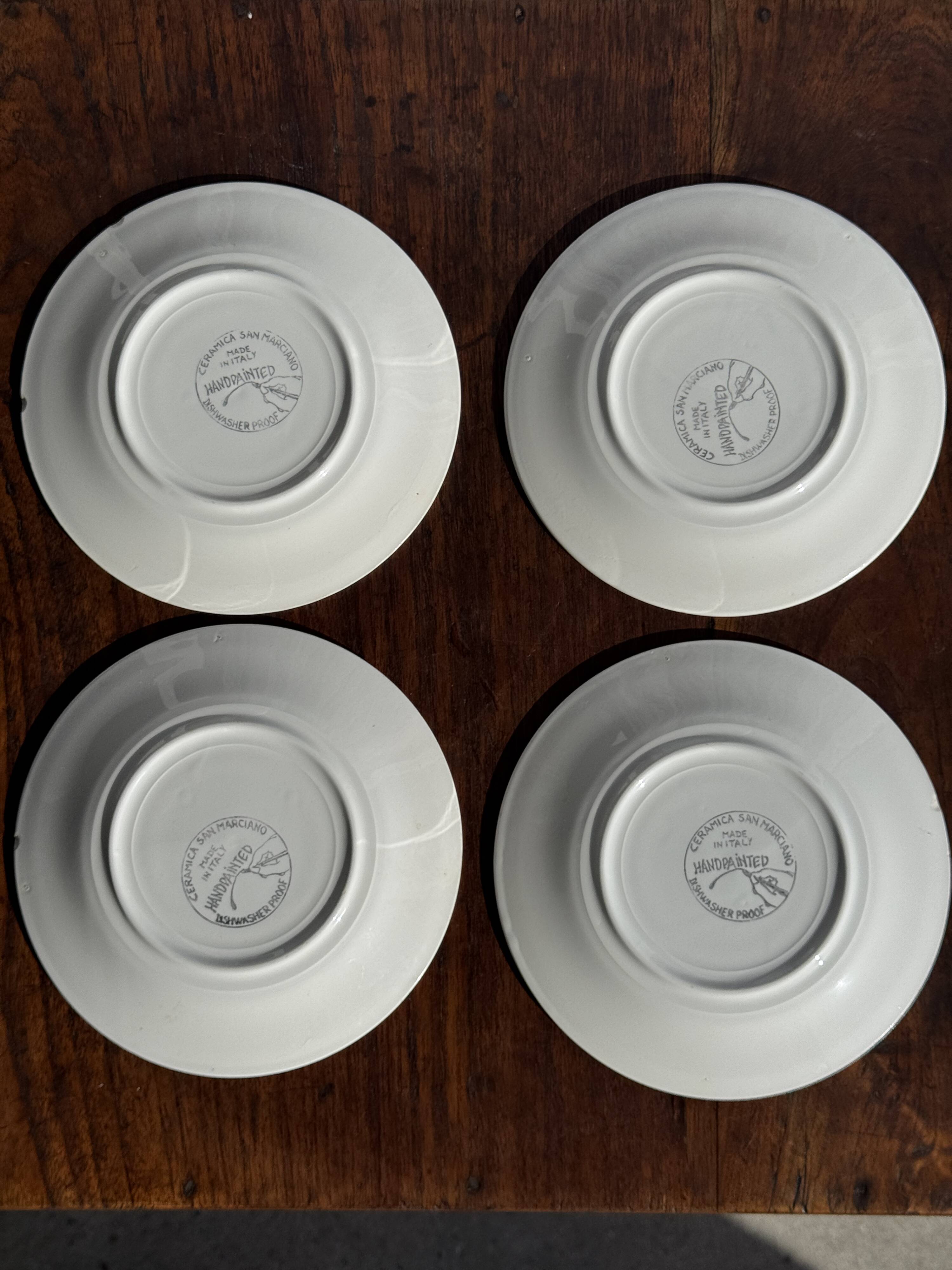 Set of 4 Italian ceramic plates in green, orange, and yellow splashes D20.