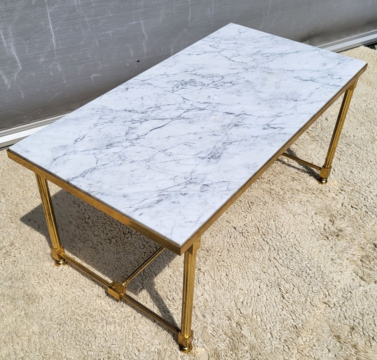 Hollywood Regency style coffee table • marble and brass