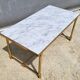 Hollywood Regency style coffee table • marble and brass