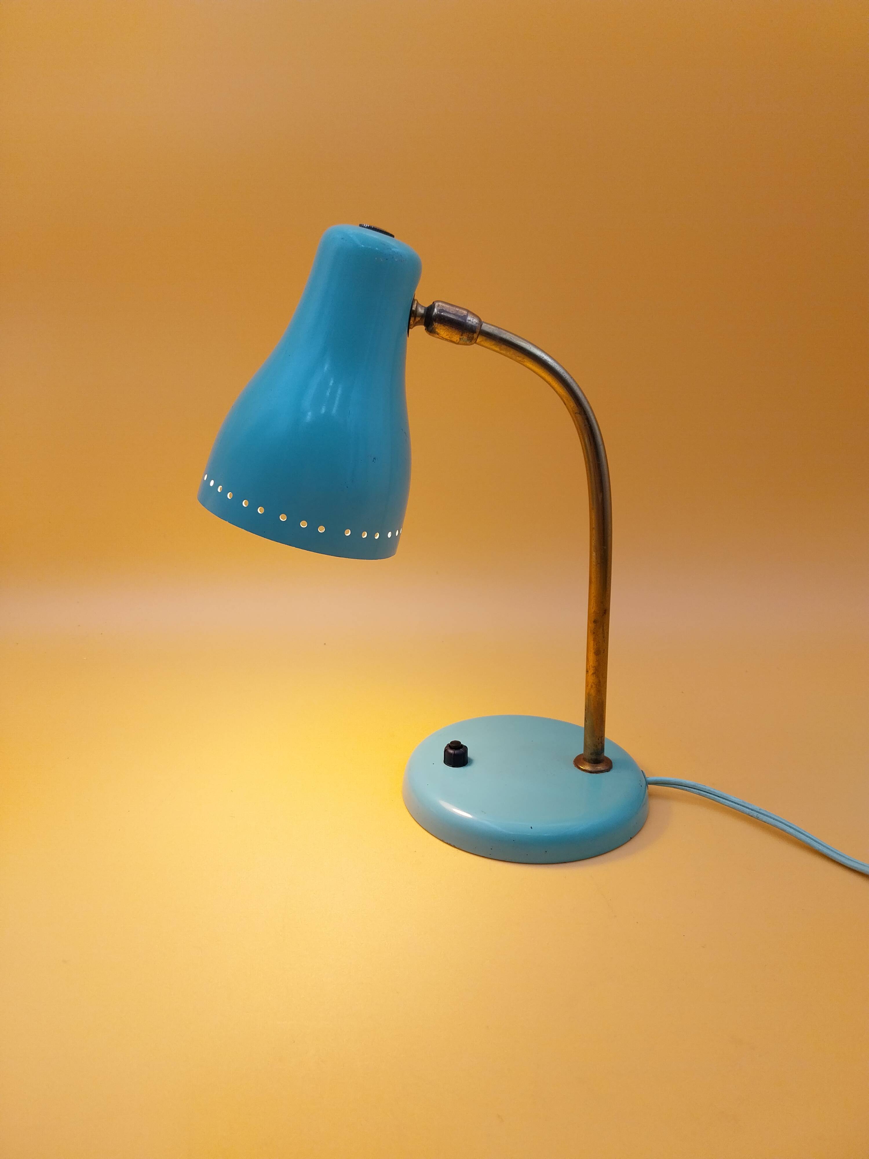 Green brass desk lamp with a goose neck on a ball joint from the 1960s.