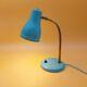 Green brass desk lamp with a goose neck on a ball joint from the 1960s.