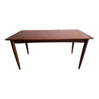 Scandinavian type table with integrated extension