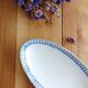 Iron clay dish with earthenware lions