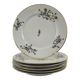 6 flat plates decorated with barbs
