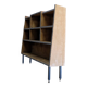 Asymmetrical shelf with lockers on feet