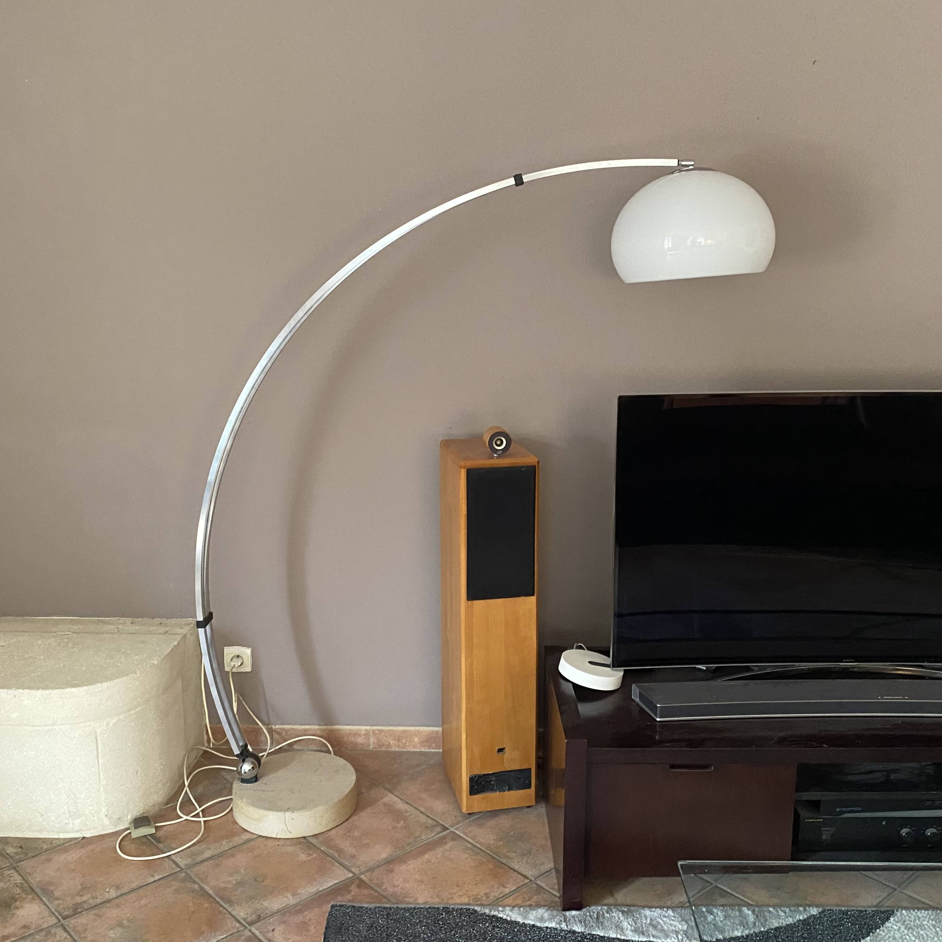 Guzzini arc floor lamp. 1970. Italy. Marble base.