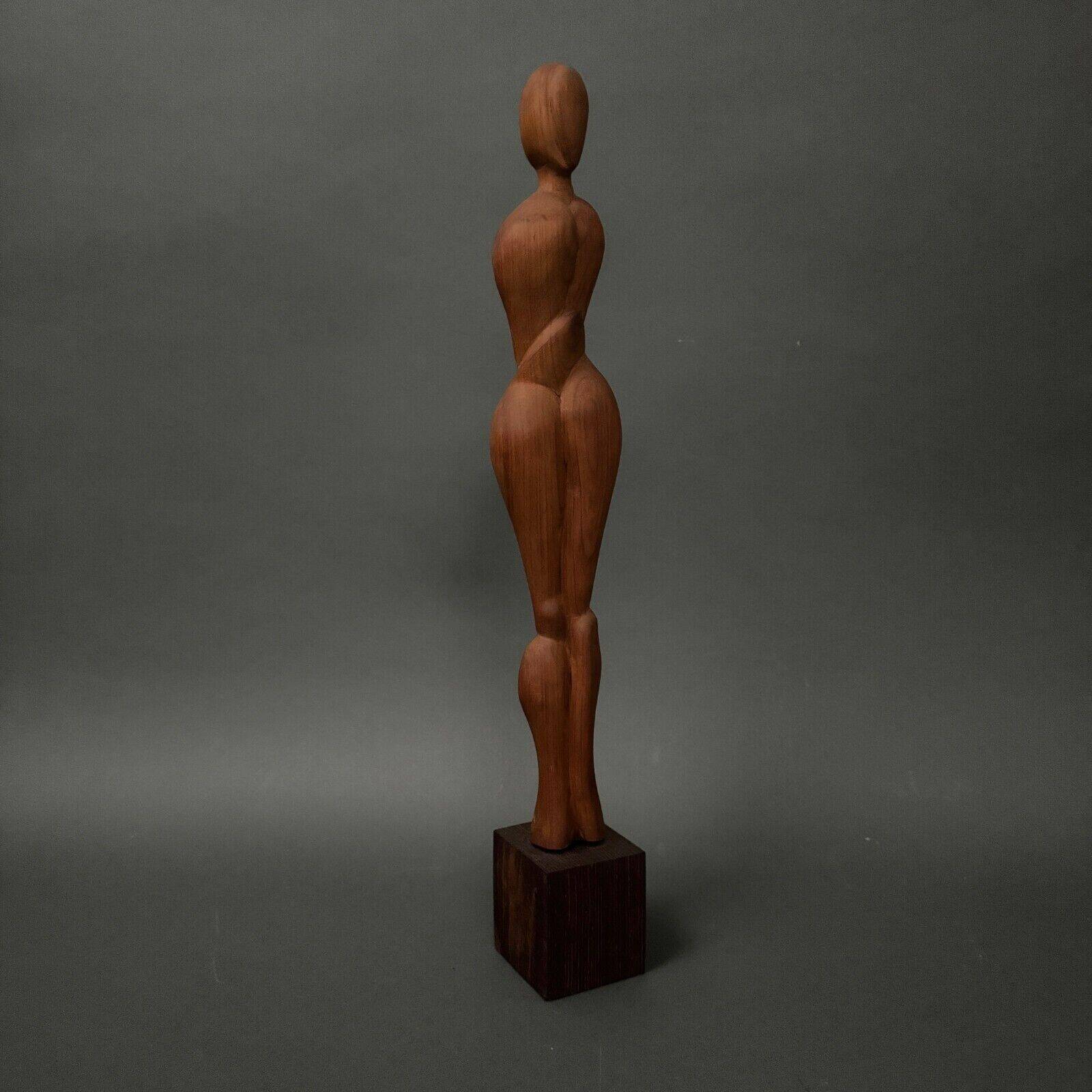 Carved wooden sculpture of a woman by Calin Hentea, 20th century