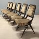 Lot de huit chaises vintage avec embouts en laiton