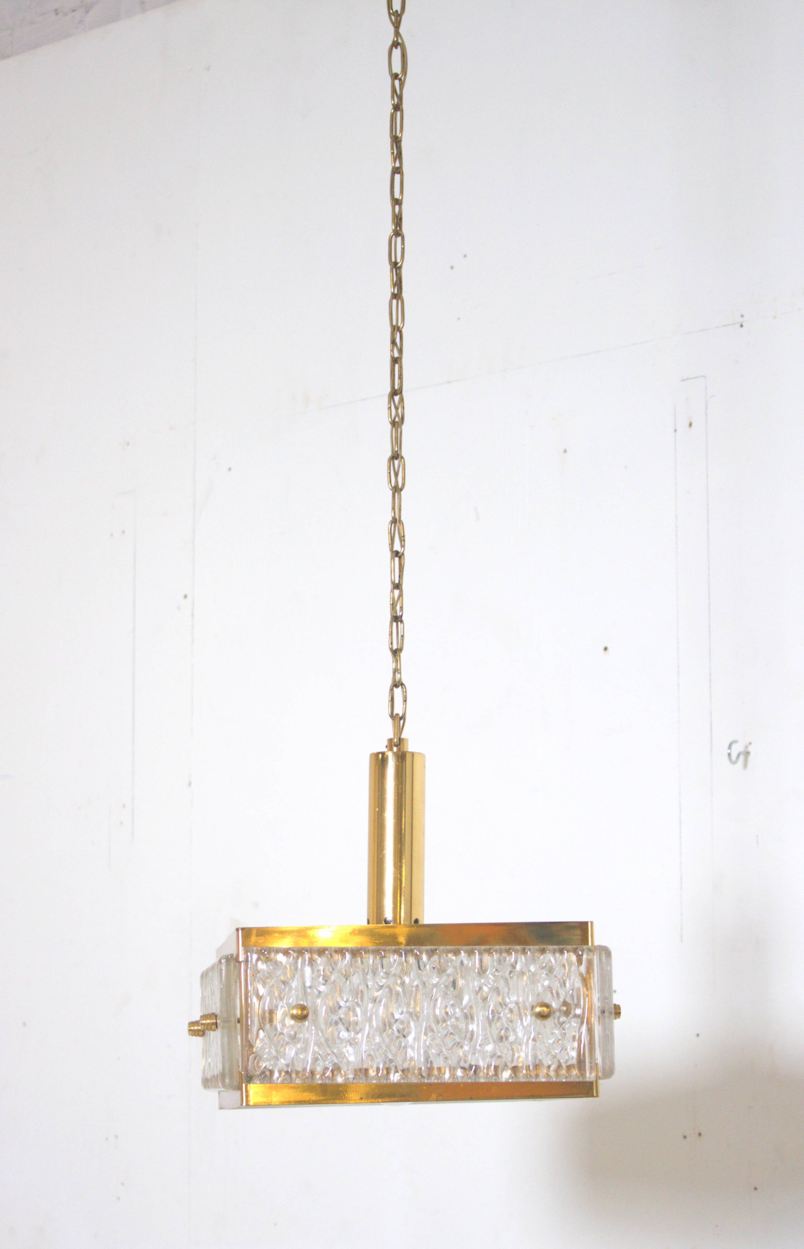 Vintage chandelier from Malmö Metallvarufabrik and pressed glass from Orrefors 1970s
