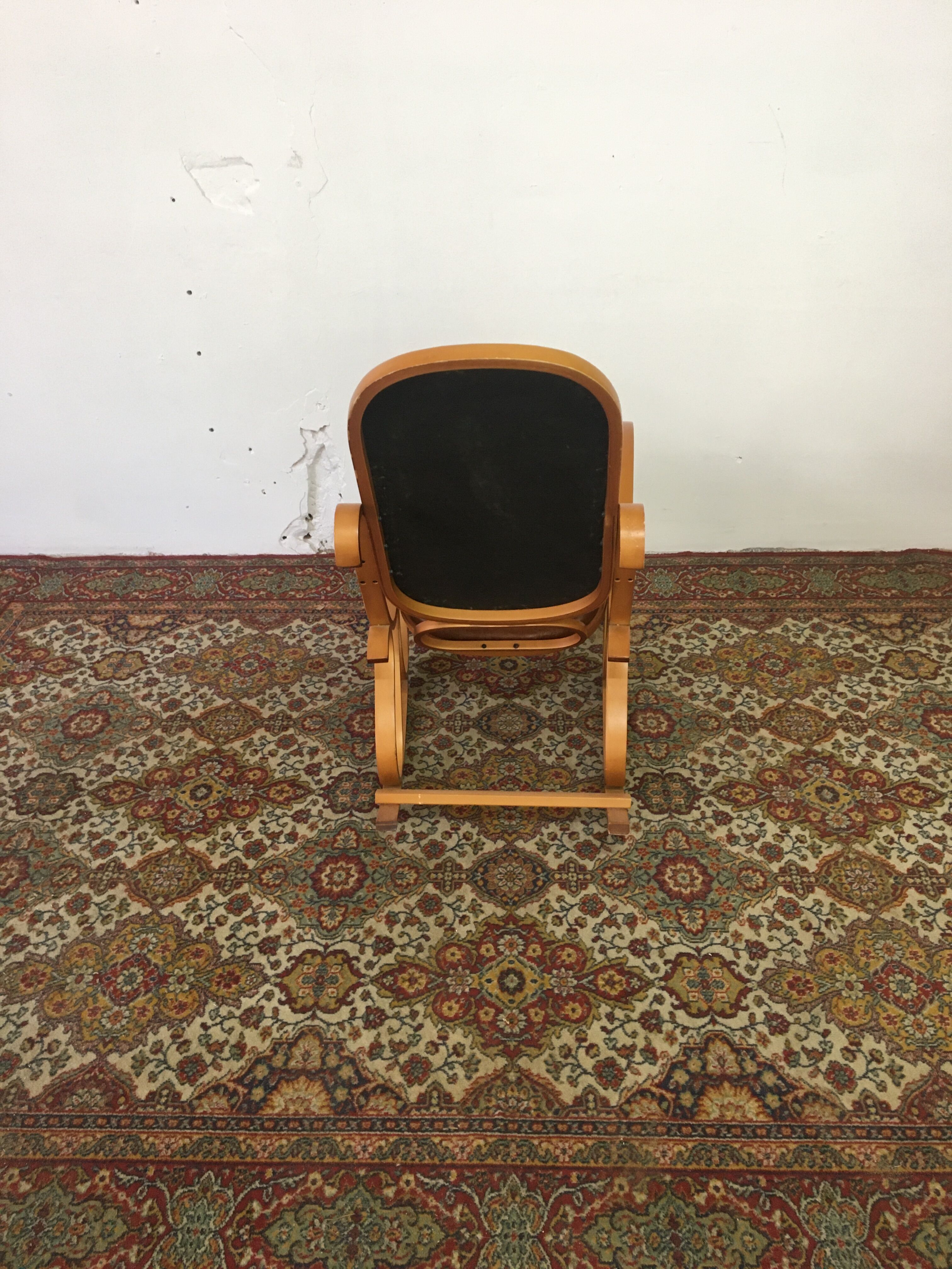 Rocking vintage chair in plywood