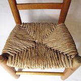 Old child chair in wood and straw