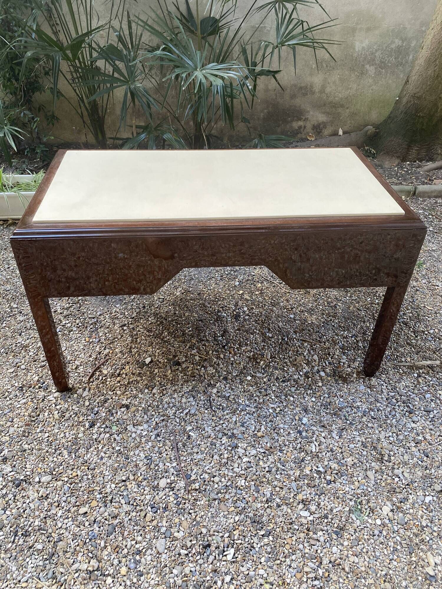 Art Deco desk in varnished mahogany.