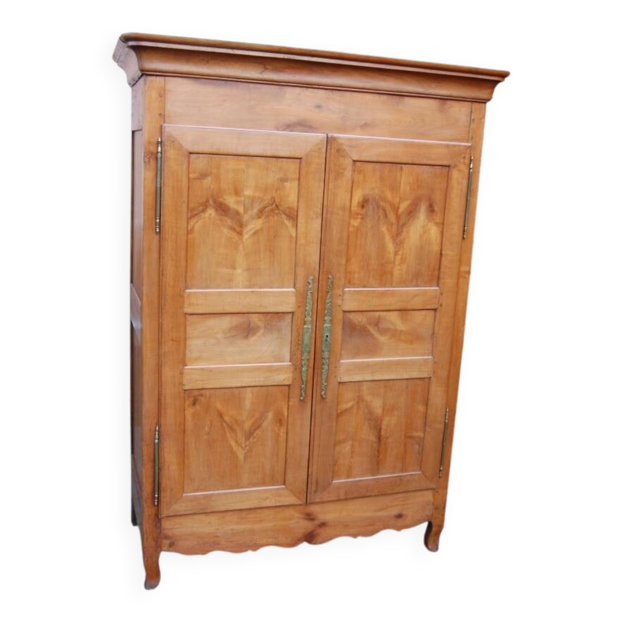 Louis Philippe wardrobe in golden cherry wood from the 19th century.