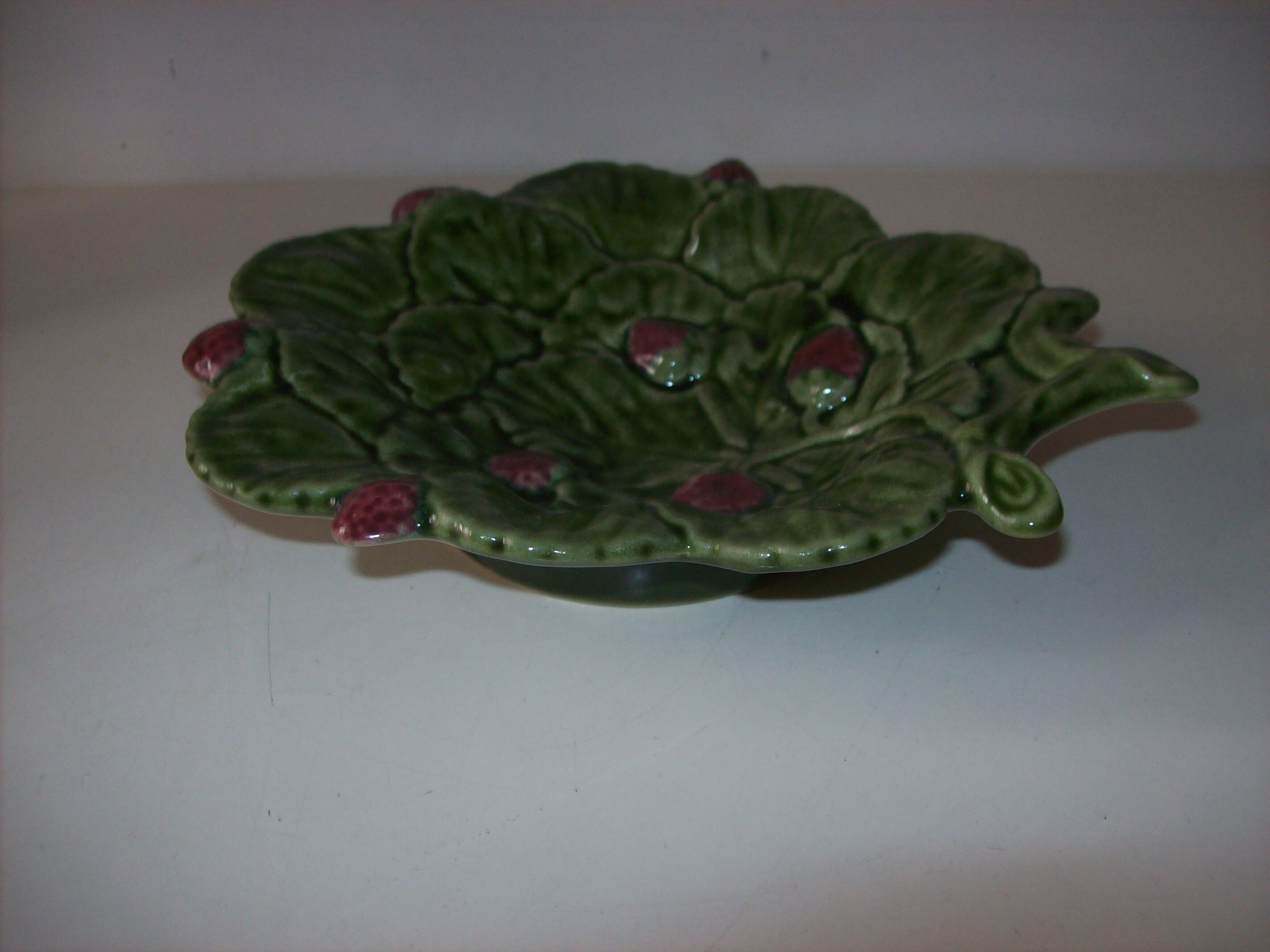 Tidy with raspberry decoration