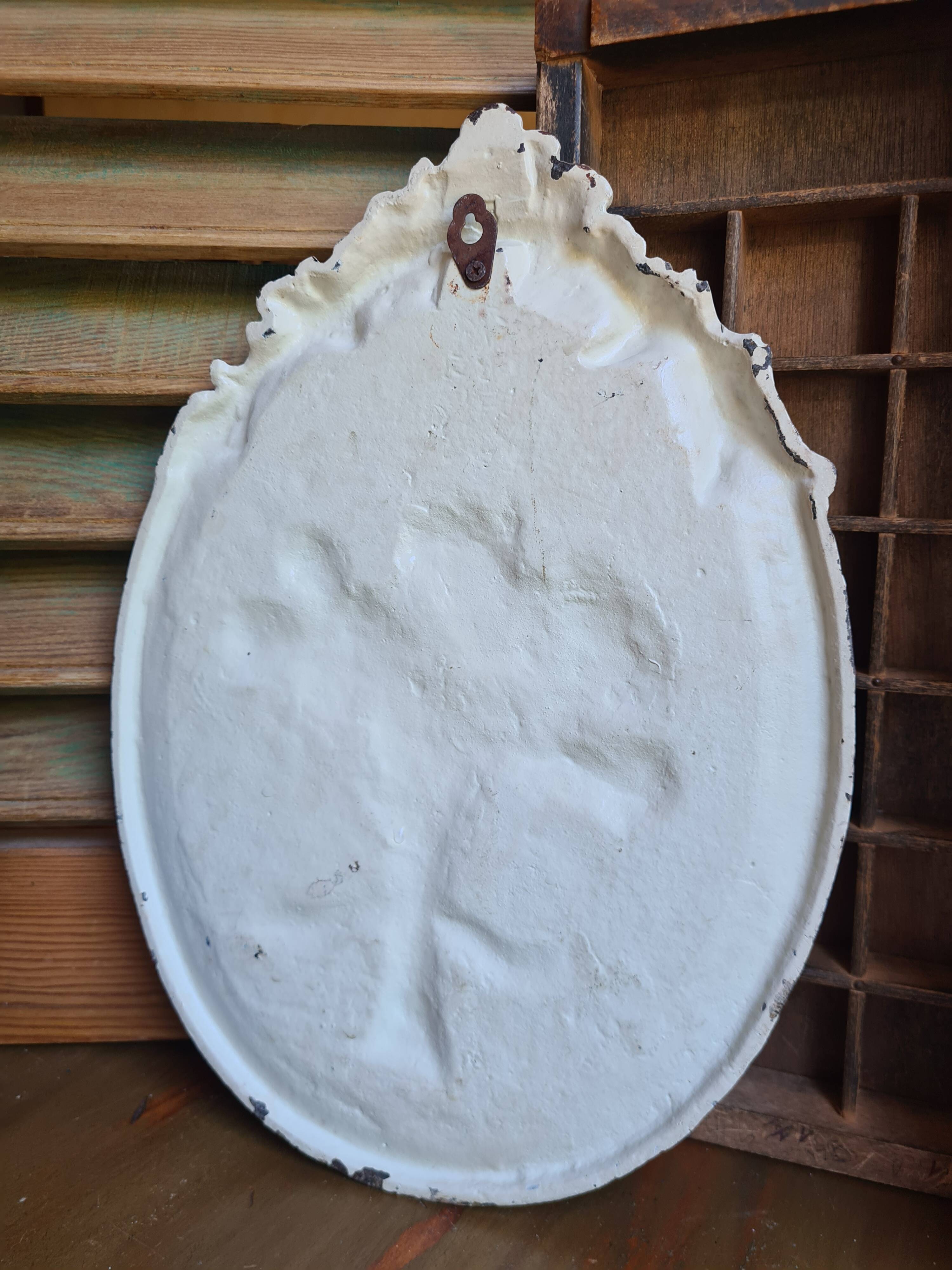 Cast iron plaque