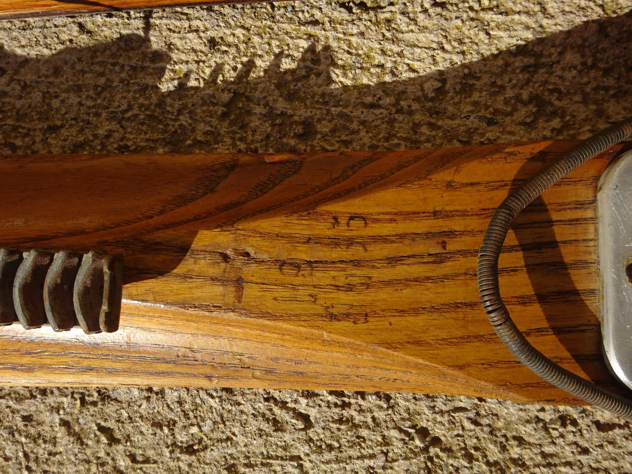 Pair of old wooden skis and metal bindings altiere