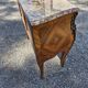 Louis XV style jump commode with marquetry and marble decoration.