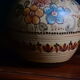 Hand-painted terracotta jug