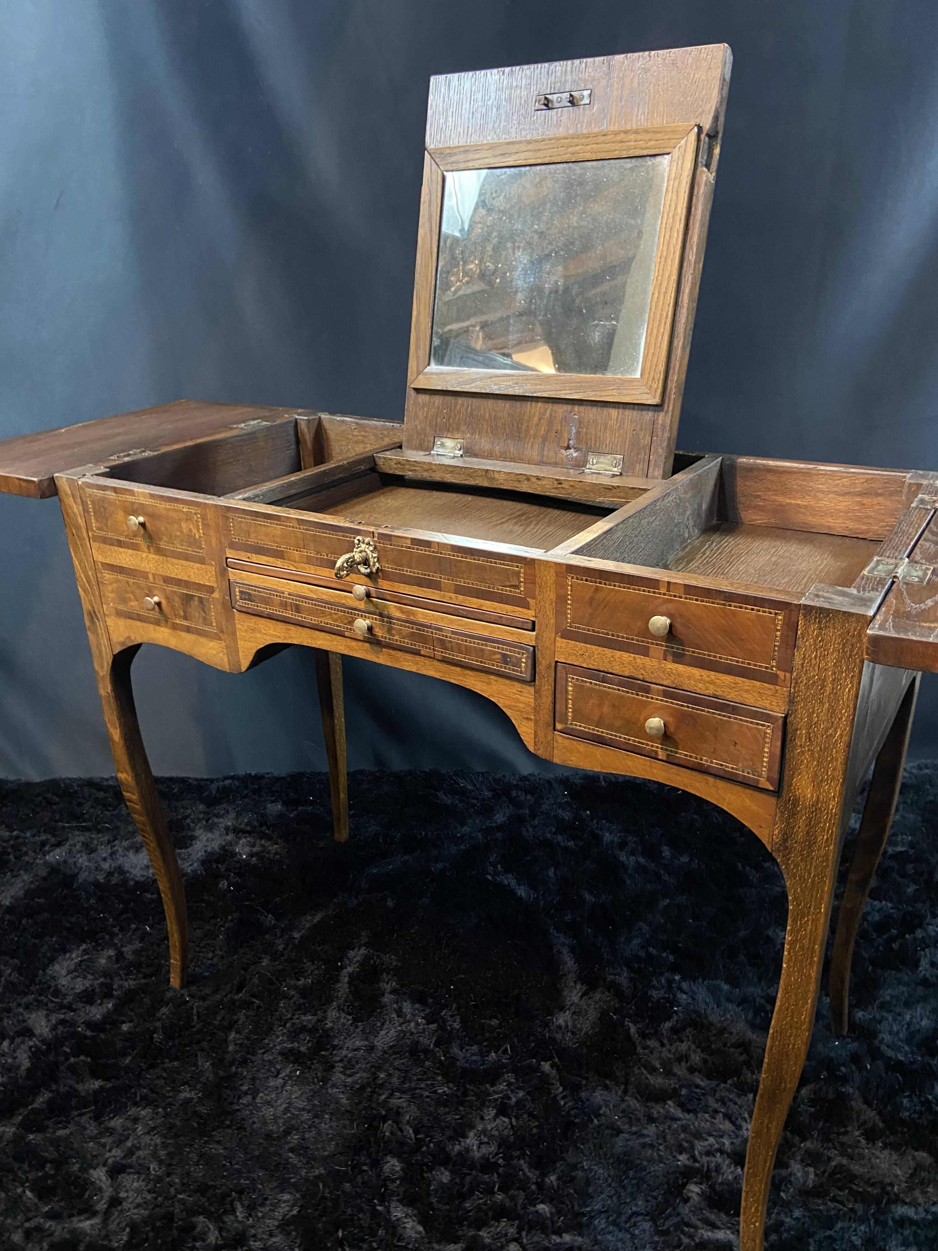 19th-century hairdresser with marquetry decoration on oak in the Louis XV Transition style.