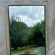 Vintage 1950s neoclassical style gold metal mirror