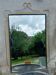 Vintage 1950s neoclassical style gold metal mirror