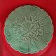 Green Sarreguemines dish from the 1950s. Light Raisin relief model.