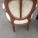 Paire de fauteuils medaillon