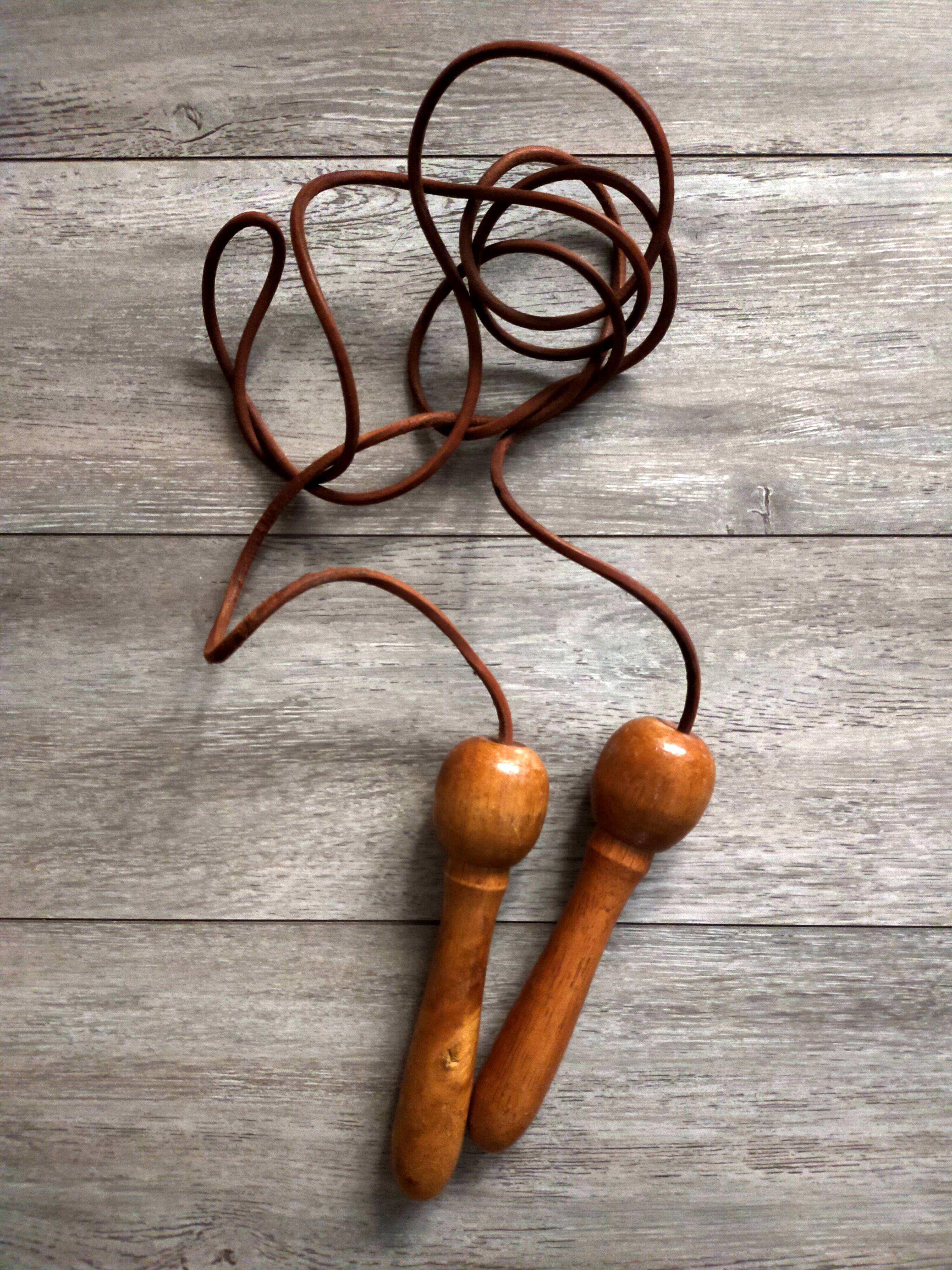 Vintage wood and leather jump rope