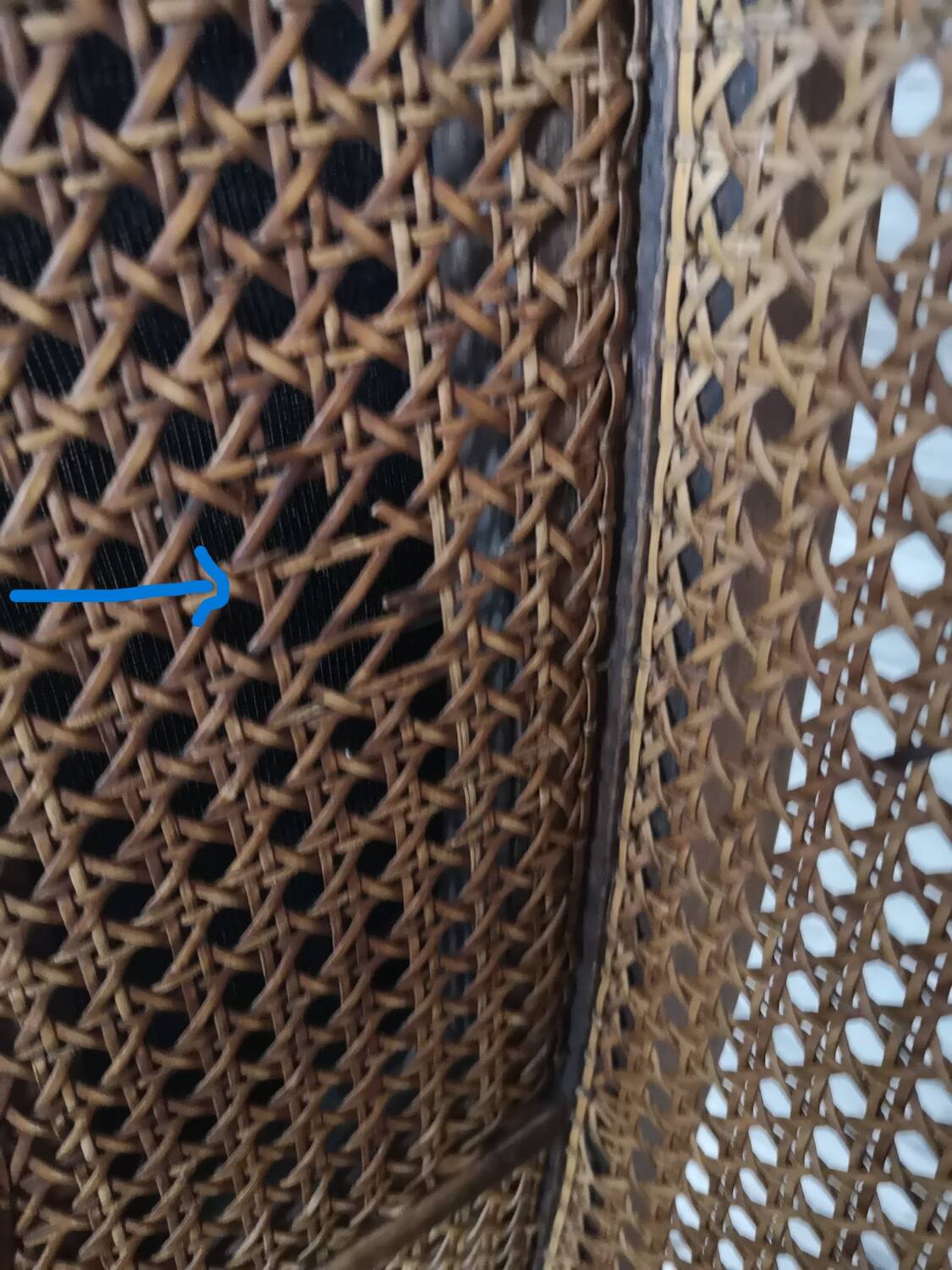 Antique wingback armchair