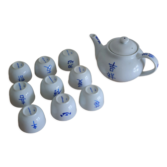 Teapot set and 9 cups with Chinese and French words