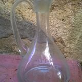 Carafe has décor engraved with foliage
