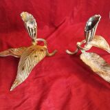 Pair of patina metal candle holders