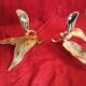 Pair of patina metal candle holders