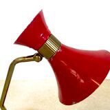 Brass desk lamp with articulated red diabolo lampshade