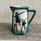 Polychrome slip pitcher "Landais Shepherd Waders"