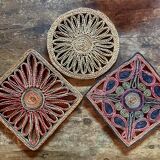 3 woven straw trivets