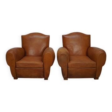 Pair of French club chairs with moustache back in cognac leather, 1950s