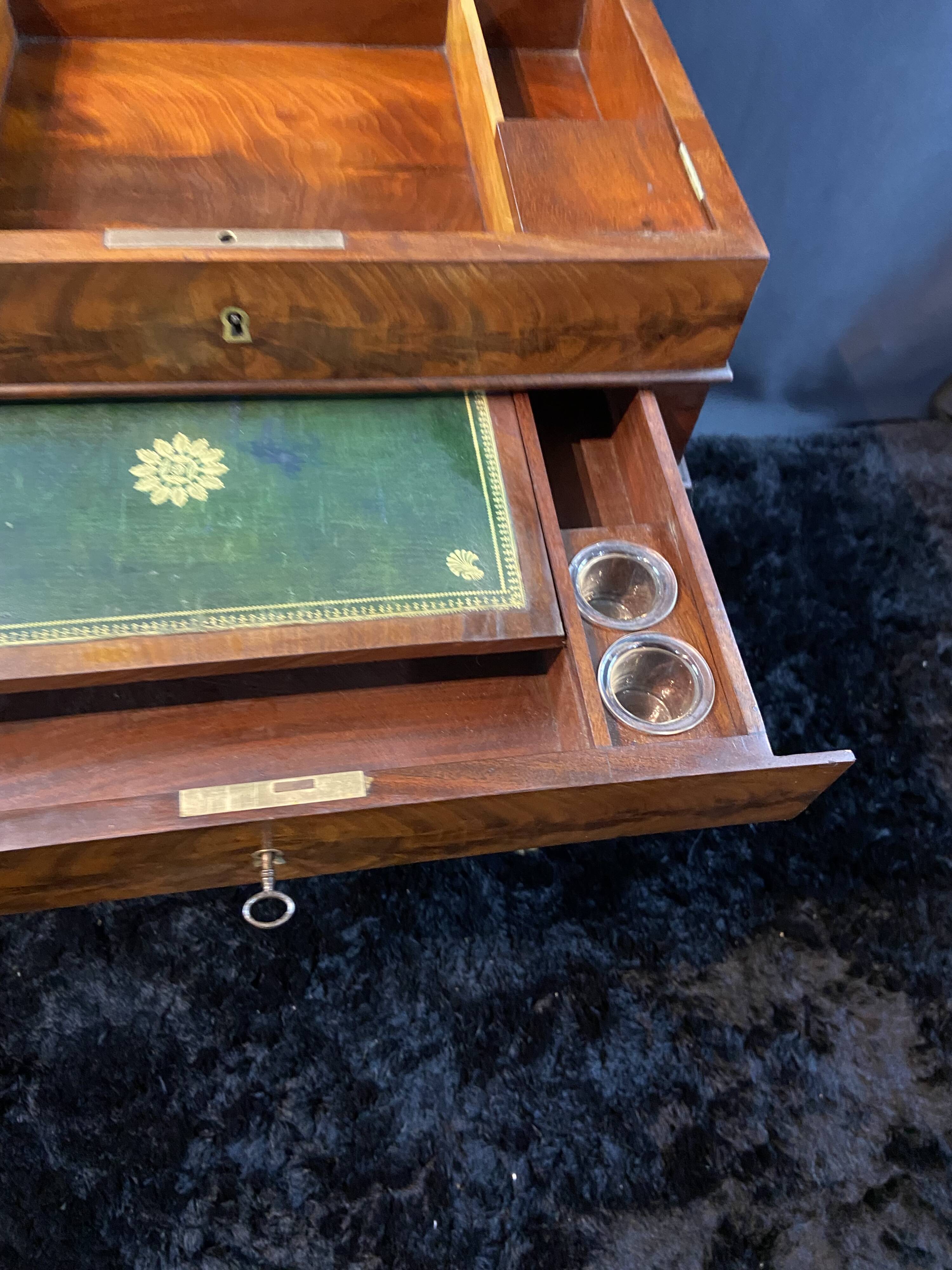 Louis-Philippe period mahogany writing desk with candlestick, 19th century