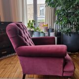 Upholstered velvet armchair