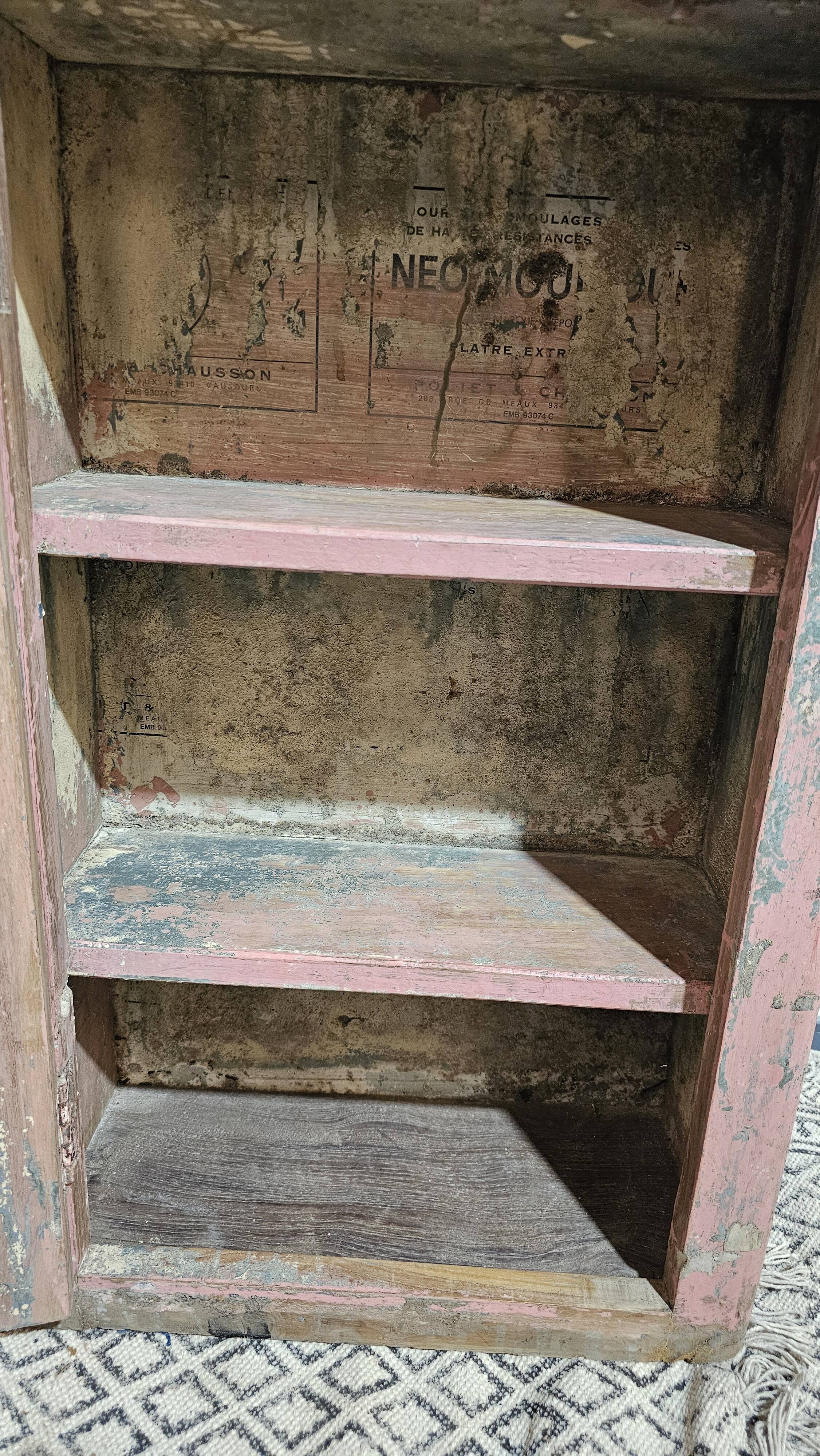 Pink showcase in Burmese teak